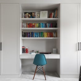 Perfect symmetry ! bespoke desk and wardrobes creating workspace 