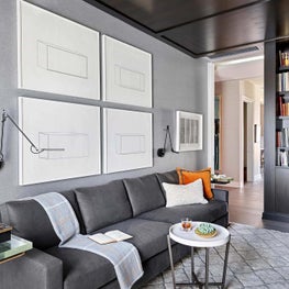 Study, Phillip Jeffires Flannel Wallcovering, Patterned Stark Rug, Monochromatic Palette, Donald Judd Grey Sofa, Holly Hunt Sconces - Old Town Penthouse Project