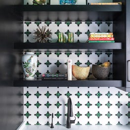 Mosaic Backsplash and custom shelving in renovation galley kitchen