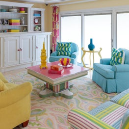 Bold colors and bright whites create an upbeat and lively family room! 