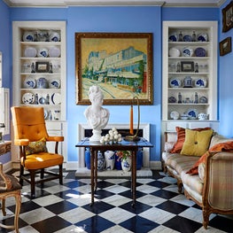 Grandmillenial vibes shine bright in this small, but layered living space full of antiques and collectibles.  As seen in Luxe Magazine.