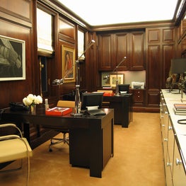 Wood-Paneled Home Office with Modern Fixtures 