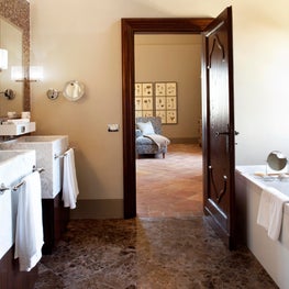 Sleek lines and color palette create a classic bathroom