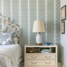 Master bedroom with painted grasscloth wallpaper by Schumacher 