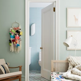 Tropical-Scandinavian nursery and little girl's bedroom on Park Avenue