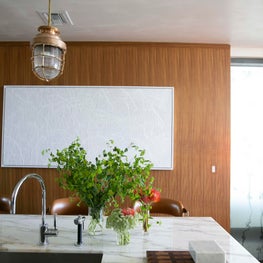Coconut Grove Miami Kitchen with Vintage Light Fixtures. Custom Wall Panels & Custom Counter Stools