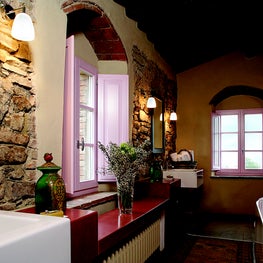 A unique mix of natural materials, modern fixtures and pops of pastel