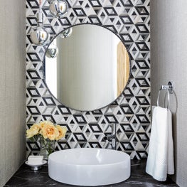 Portfolio: Houston high-rise powder room with statement wallpaper and dramatic marble