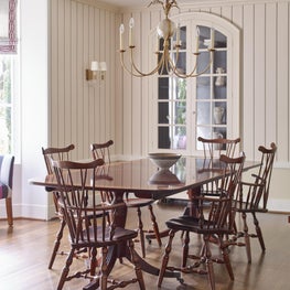 A Traditional Dining Room with Built In Cupboard
