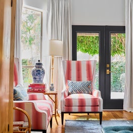 Master Bedroom Sitting Area with Upholstered Wing Chairs