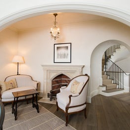 Stair Hall Inglenook with Gothic Stone Mantle and Antique Terra Cotta Fire Tiles