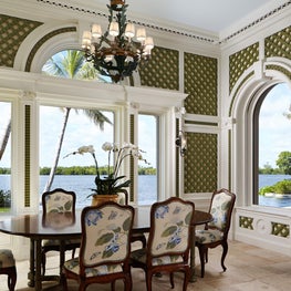 Treillage and antique limestone in a garden-reminiscent breakfast room