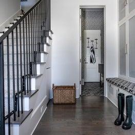 Portfolio: Modern mud room featuring a series of black and white patterns.