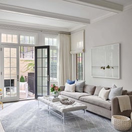 Living Room, Cream Walls, David Burdeny Art, Stark Carpet Rug, Montauk Sofa, Upholstered Coffee Table - Lincoln Park Greystone Project