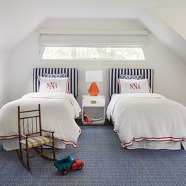 Hamptons Boy's Bedroom with striped headboards and monogrammed pillows
