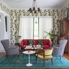 Living Room with recovered vintage pieces and Schumacher wallpaper 