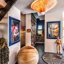 Artful Entry to a Modern Home Features Custom Lighting, Original Art and Salvaged Finds