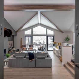 Our team completely overhauled the window program in the great room to capitalize on the expansive views of the Continental Divide.