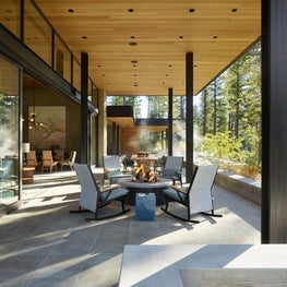 Tahoe Marvel, Outdoor fire pit area with large sliding doors to the Great Room. 