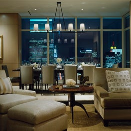 Living Room in NYC apartment, floor to ceiling windows, open floor plan 