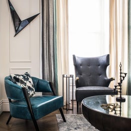 17th Street Residence, Living Room with mid-century pieces and wall molding