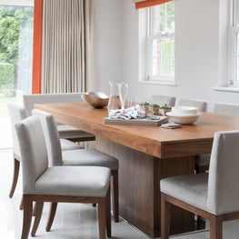 Open plan living, dining and kitchen warmth and texture with a pop of colour 