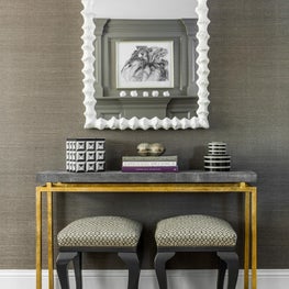 Accessorized Brass Accent Console Table with Upholstered Black Benches