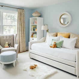 Traditional nursery in blue and white with daybed