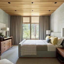 Tahoe Marvel, Guest Bedroom with grey grasscloth wallpaper and custom bedding.