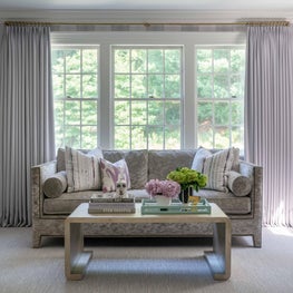 Master Bedroom Sitting Area with Loveseat and Drapery