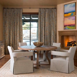 Breakfast room displays a great combination of modern and antique pieces