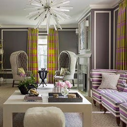 Historic Chestnut Hill Living Room with Starburst Chandelier & Colorful Drapery