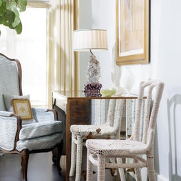 Sitting area in guest bedroom with eclectic antique treasures
