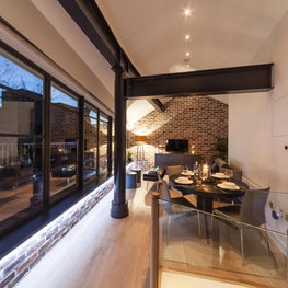 Kitchen diner, Butlers Wharf London, view at night-time