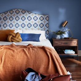 25th Street  - Bedroom with Custom Upholstered Headboard in fun fabric pattern