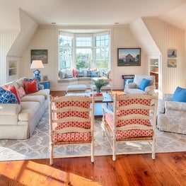 The classic blue, white and red palette is coastal chic.