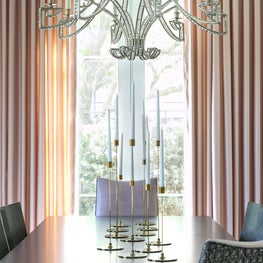 Portfolio: Soft and romantic formal dining area with blush, velvet seating and drapery.