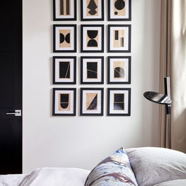 Portfolio: Modern guest room with contemporary art wall featuring the works of Josh Young