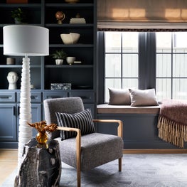 Drawing inspiration from our client's love of the ocean, we integrated shades of blue and natural materials into this home study.