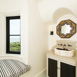 Powder Room with Curved Bay Padded Window Seat and Petrified Wood Sink