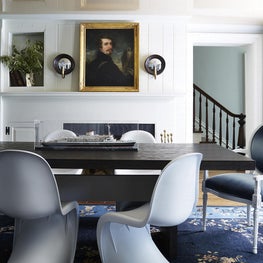 Hudson Valley Glam / Glossy blush ceiling mirrors this 1780s room with an eclectic mix of pieces anchored by a chinese art deco rug with lovely blossoms.