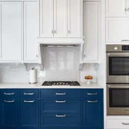 Classic Kitchen with Blue Lower and White Upper Cabinets, Custom Hood