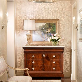 David Goldberg Design Wallpaper complemented by a polished nickel chandelier