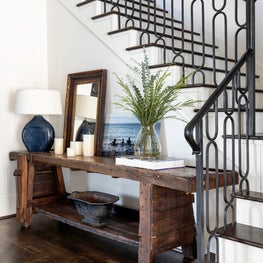 Portfolio: Houston entryway with wooden table and blue accents