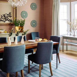 Contemporary dining room with traditional elements and grasscloth wallpaper