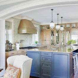 Kitchen island painted in Farrow & Ball's Down Pipe to mitigate its large size