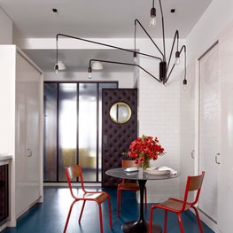 Central Park Apartment, White Kitchen with Stained Blue Concrete Floor