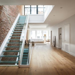 Union Square Penthouse, Glass Staircase at Entrance Foyer