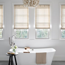 A primary bath that is all about layer, light and texture.