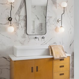 A vintage Pascoe credenza from MoModerne's shop set the entire tone for the renovation. The direction of paired down, scaled back but necessary luxury